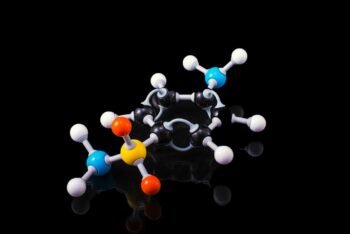 3D molecular model representing a chemical compound against a black background