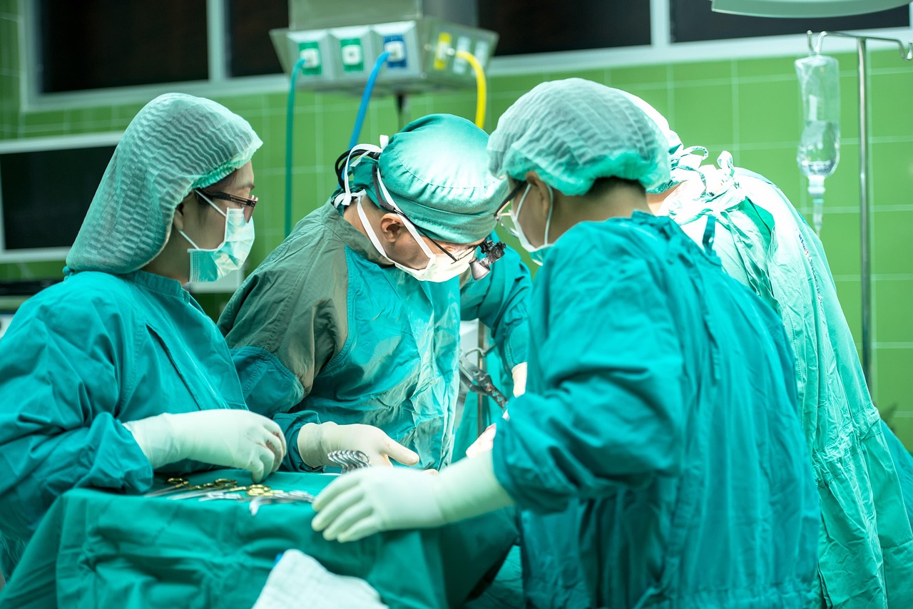 Surgery, hospital, doctor — Advancing Reproductive Health: Dr. Tyrone Malloy's Contributions