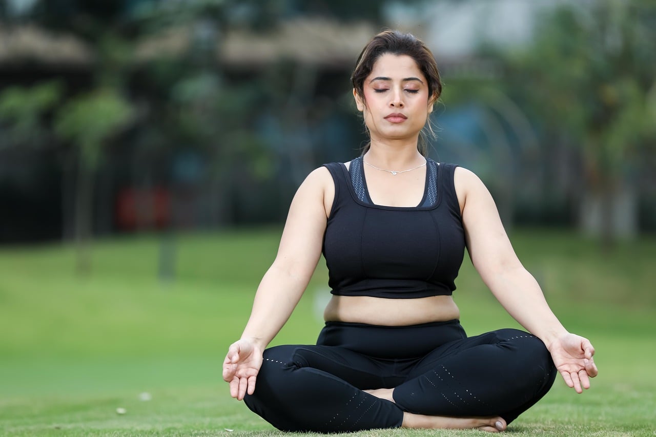 Woman, yoga, meditation — Broad spectrum vs full spectrum CBD products and what you should know