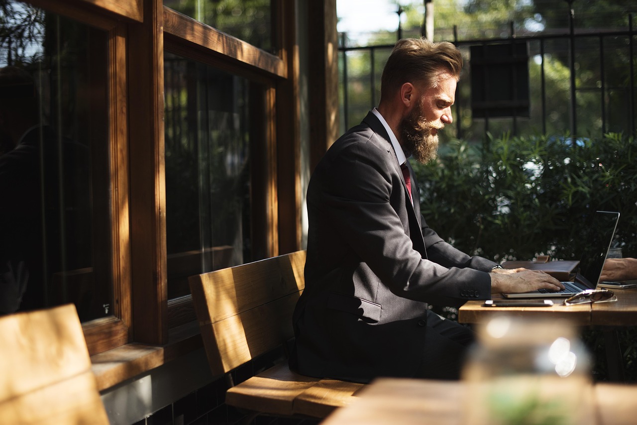 Beard, business, business people — Exploring the Importance of SMS Verification Online