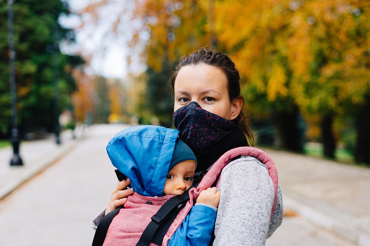 Woman, child, face mask — Medigap Insurance Plans - Types of Plans Available to Choose From