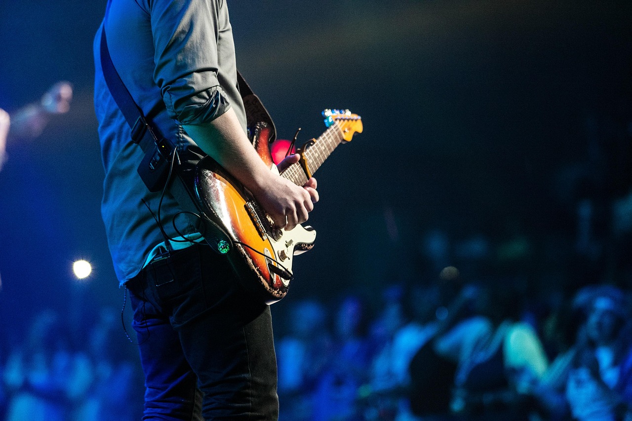 Audience, concert, guitar — The History and Evolution of UFA Gambling