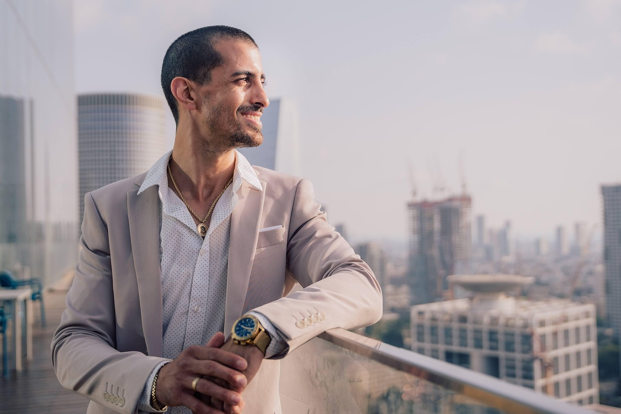 Man, suit, success — The Human Element: Stuart Piltch's Leadership in Employee Engagement
