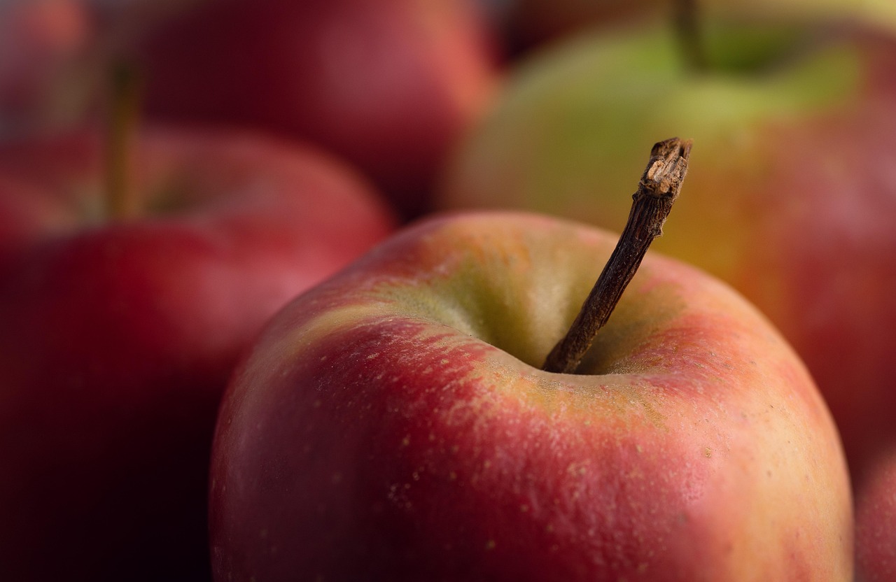 Apple, healthy, red — Veneer Excellence: Dr. Wade Newman's Path to Perfect Smiles