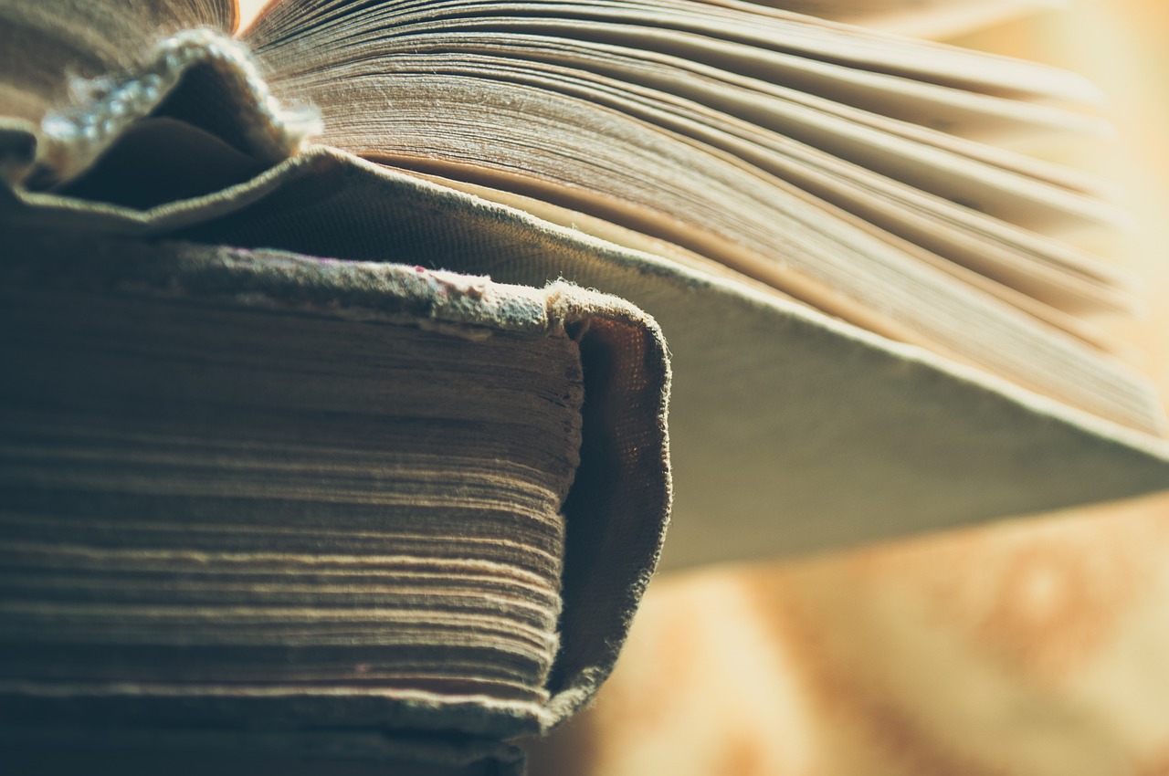 Books, old, stack — Who makes use of the TOEIC?